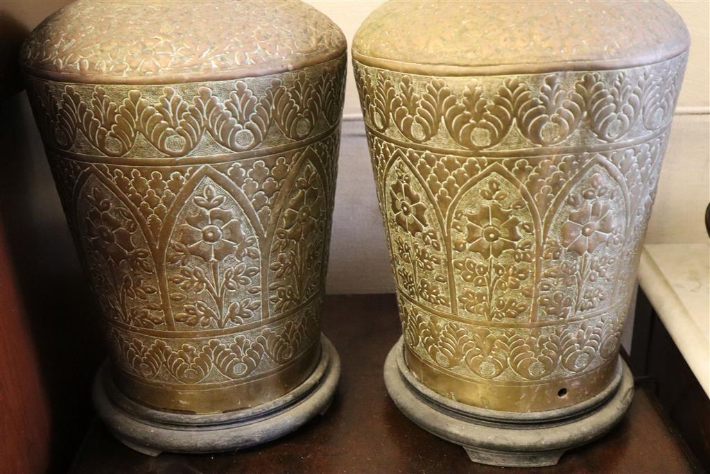 A pair of Indian embossed brass baluster shaped table lamps, height 50cm